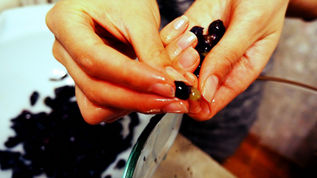 The Sticky Purple Mess Pulling grapes from their skins